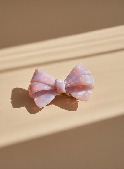 Pink and lilac Blush ombré aztec bow hair clip bow hair clip on a beige background