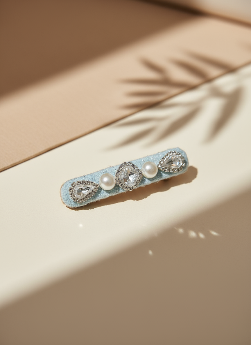  handmade decorative lace hair clip with pearls and Swarovski crystals on a soft neutral background. Only at Petite Murmure 