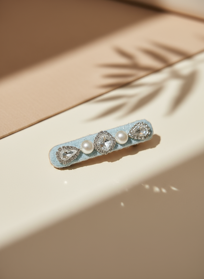  handmade decorative lace hair clip with pearls and Swarovski crystals on a soft neutral background. Only at Petite Murmure 