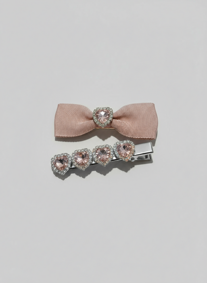 Pink bow hair clip with Pink bow hair clip with Blue bow hair clip with pink ribbons and pink heart shape Swarovski crystals  on a light gray background