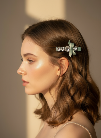 Woman with a Swarovski crystal detailed hair clip in her hair against a neutral background