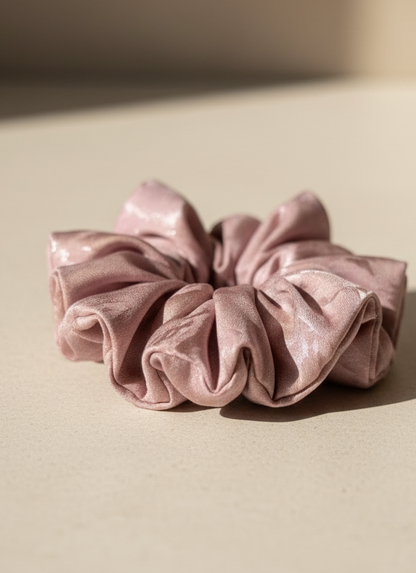 Pink handmade rose aromatic scented mulberry silk scrunchie on a beige background