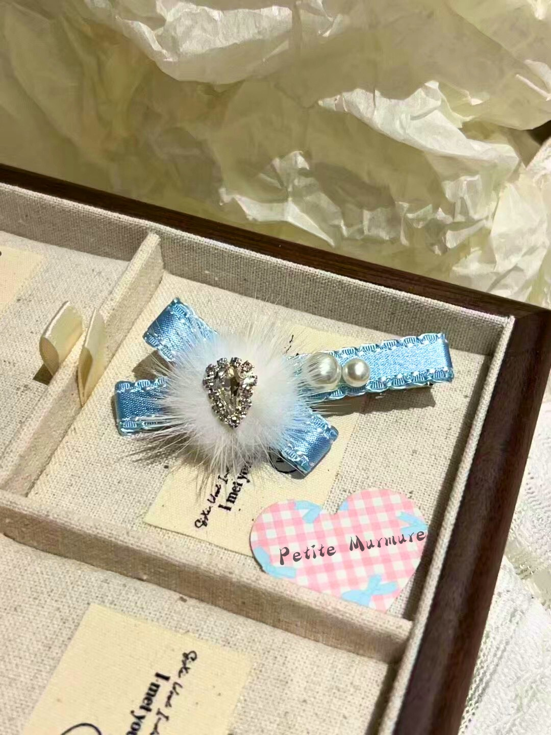 Snow Pom Pom Criss Cross Clip